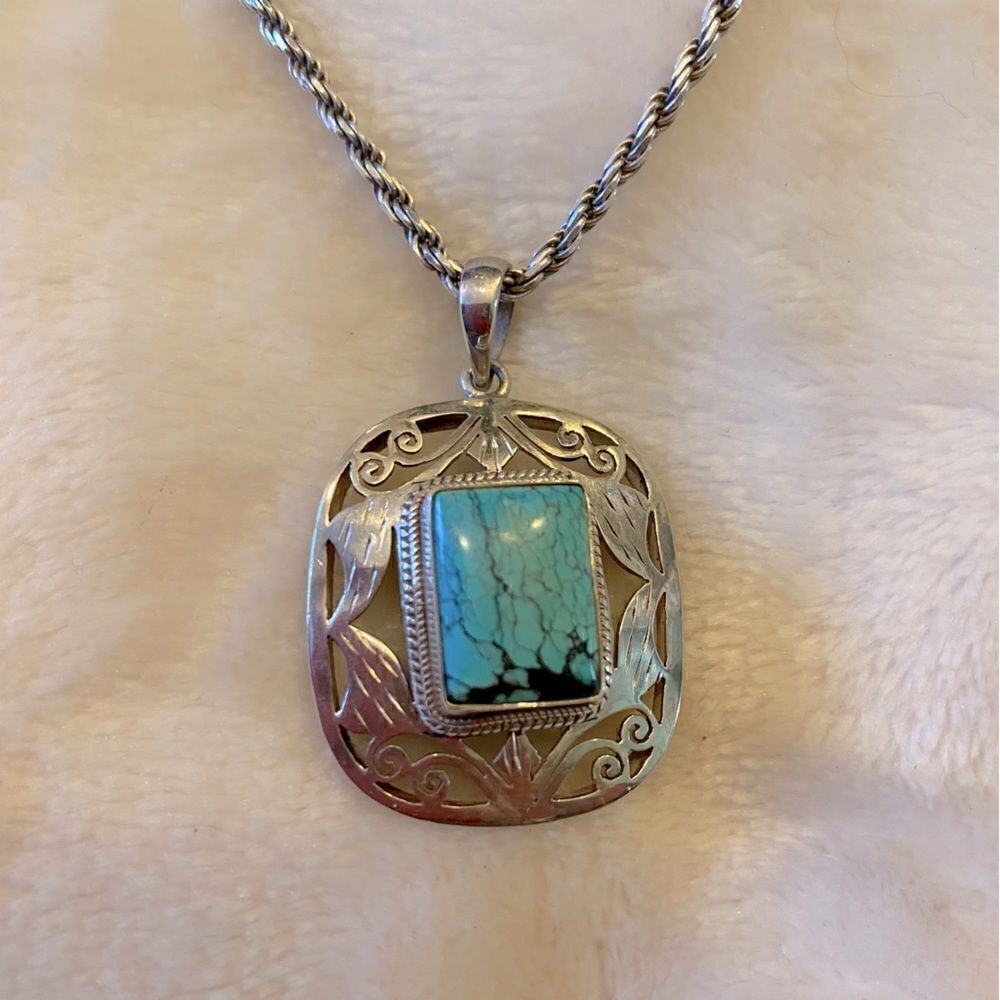 Authentic Handmade Turquoise sterling silver pendant from Nepal. Pendant only.